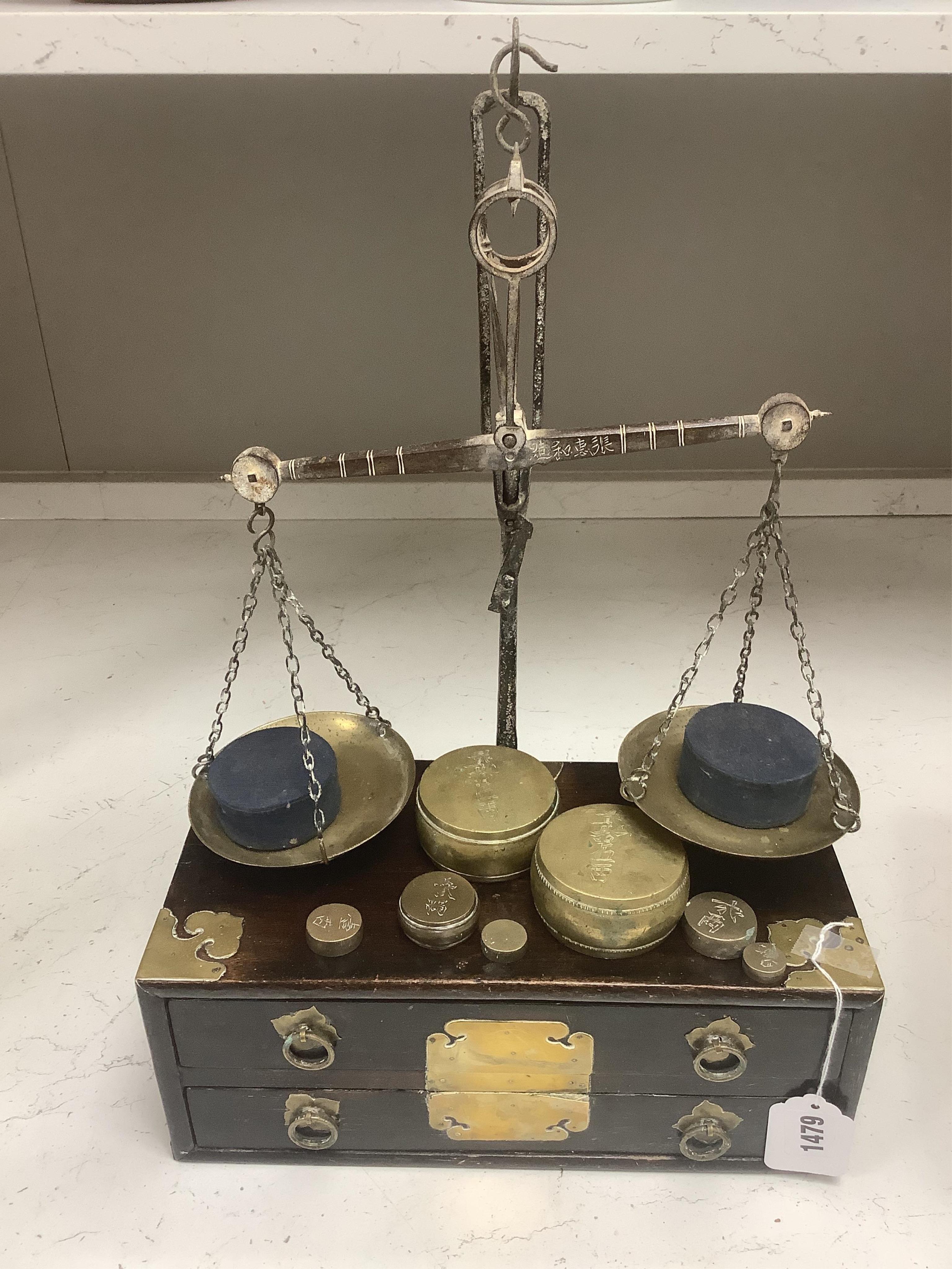 A pair of 19th century Japanese wood and brass mounted scales and weights, 31.5cm wide